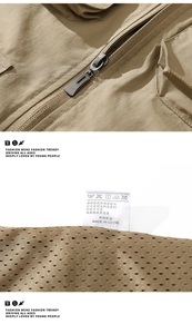 Detail der khakifarbenen Outdoor-Weste mit Metallreißverschluss und Netzfutter