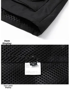 Détail de la doublure en maille respirante et de l'étiquette XL sur le gilet noir
