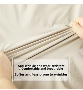Detail of light beige shirt fabric showing high elasticity and anti-wrinkle texture