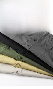 Detail view of multi-color cargo shirts with high-stretch textured fabric and double stitching