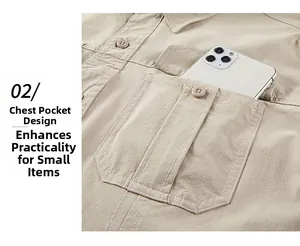 Close-up of functional chest pocket with button flap on khaki long-sleeve cargo shirt