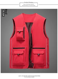 Detail of red mesh fishing vest with reflective safety stripes and large utility pockets