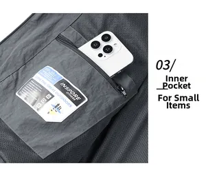 Detail of inner zipper pocket and breathable mesh lining on men's windbreaker