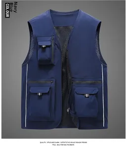 Detail view of navy blue functional mesh vest with zipper pockets and breathable lining