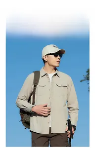 Detail showing outdoor cargo shirt with ripstop texture and double chest pockets