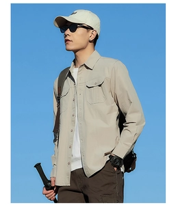 Detail of khaki tactical long sleeve shirt with double chest pockets for outdoor wear