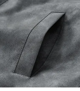 Close-up detail of the slant pocket on this vintage distressed leather jacket for men