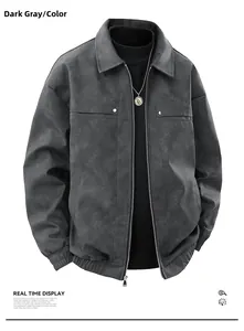 Detail of dark gray faux suede jacket featuring zipper front and snap chest pockets