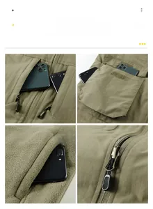 Detail of outdoor tactical vest showing multi-pocket system and metal zipper closure