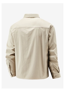 Detailed back view of khaki workwear shirt featuring a horizontal yoke and neat stitching