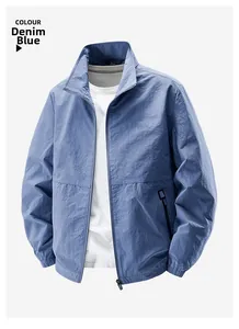 Detail view of denim blue windproof stand-collar jacket with soft nylon fabric texture
