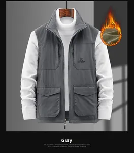 Detail of the thick grey fleece lining and立领 inner layer on an outdoor work vest
