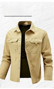 Detailed flat lay of khaki work shirt featuring double chest pockets and lapel collar
