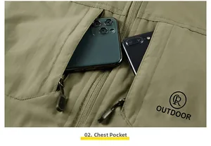 Detail of front zipper pockets on khaki outdoor vest showing large storage capacity