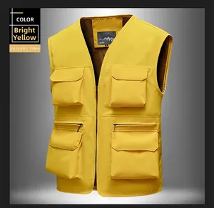 Detail of bright yellow outdoor vest with functional multi-pockets and breathable mesh lining