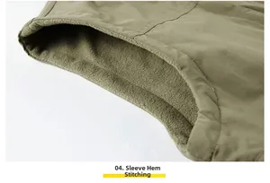 Detail of armhole stitching and warm fleece lining on olive green outdoor vest