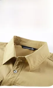 Detail view of khaki quick-dry shirt collar with fine stitching and size label