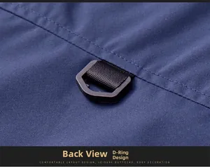 Detail of durable navy vest showing reinforced stitching and black plastic D-ring hook
