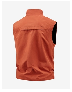 Detail view of the orange outdoor vest back with a breathable layered design and stand collar
