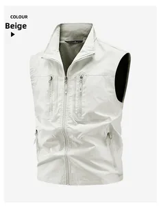 Close-up of beige outdoor tactical vest showing mesh lining and multi-pocket details