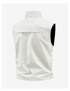 Detail of breathable back vent on a beige lightweight outdoor utility vest