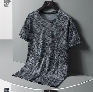 Close-up of crew neck detailing and moisture-wicking fabric texture on gray sports t-shirt