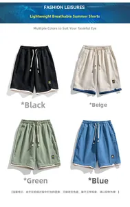Detail view of quick-dry shorts in black, beige, green, and blue with drawstring waist