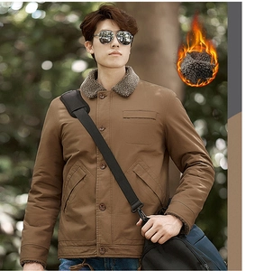 Detail of men's winter jacket with warm fleece lining and soft faux fur collar