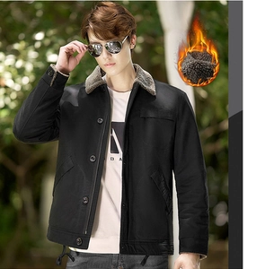 Close-up of men's winter jacket featuring thick fleece lining and warm wool collar detail