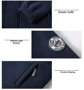 Detail view of elastic cuffs, embroidered sleeve badge and side pockets on navy fleece jacket