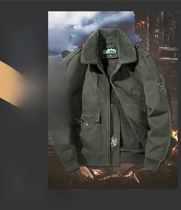 Detailed macro view of the thick gray fleece lining on a green military work jacket