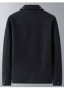Detailed back view of a men's black wool jacket with turn-down collar and shoulder seam detail