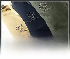 Detail of fleece collar and JP FASHION embroidery on men's winter jackets in three colors
