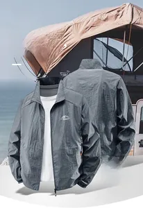 Detail of grey men's summer sun protection jacket with quick-dry breathable fabric