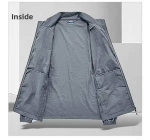 Detail view of internal pockets on a lightweight grey sun protection jacket for men