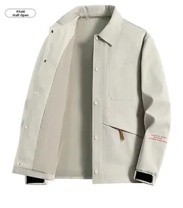 Detail of khaki jacket showing lapel collar, snap buttons, and chest pocket texture