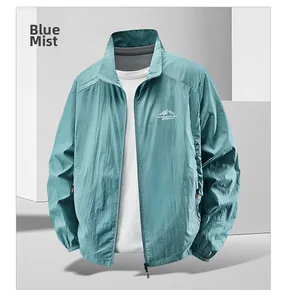 Detail of fog blue men's sun protection jacket with zip pockets and logo print