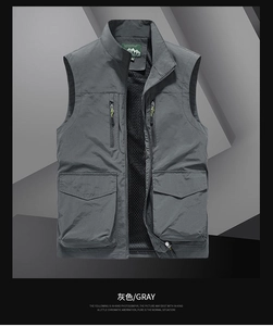 Detail of gray outdoor vest showing durable cross-hatch fabric and mesh lining