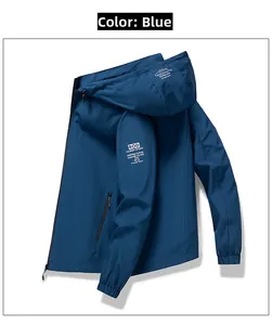 Detail of waterproof dark blue jacket featuring hood lettering and sleeve graphic logo