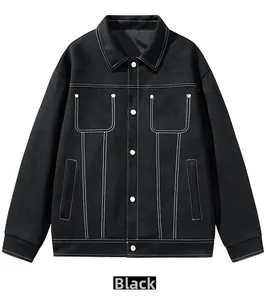 Detail of black workwear jacket featuring contrast white stitching and silver metal buttons
