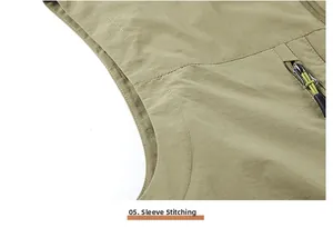 Detail of khaki outdoor vest showing reinforced double stitching and side zipper pocket