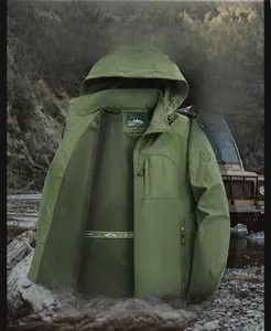Detail of military green hooded jacket featuring breathable mesh lining and zipper pocket