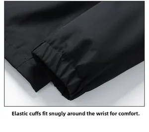 Detailed close-up of elastic cuffs on a black waterproof jacket for comfortable wrist fit