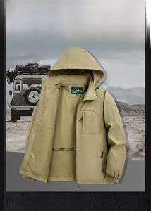 Detail of khaki outdoor jacket with breathable mesh lining and zippered chest pocket