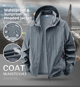 Macro detail of waterproof and breathable gray hooded sun protection jacket for outdoor use