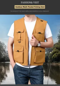 Detail of outdoor fishing vest showing functional utility pockets and metal D-ring hook