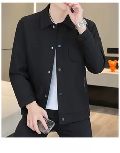 Detail of black men's casual jacket showing vertical stripe texture and chest pocket