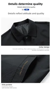 Close-up of black corduroy jacket showing sharp collar and white lettered pocket embroidery