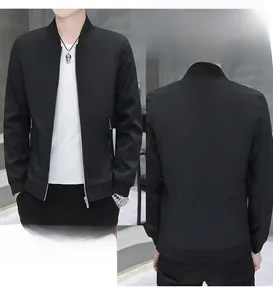 Detail of black stand collar bomber jacket with chest and back embroidery