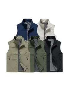 Detailed pile of outdoor vests in navy, white, khaki, green and black with mesh lining
